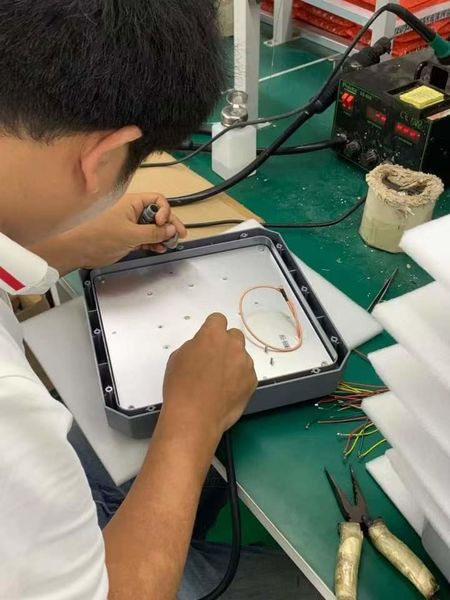Shenzhen Jutai Comm Co., Ltd. línea de producción del fabricante