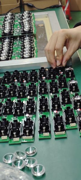 Shenzhen Jutai Comm Co., Ltd. línea de producción del fabricante