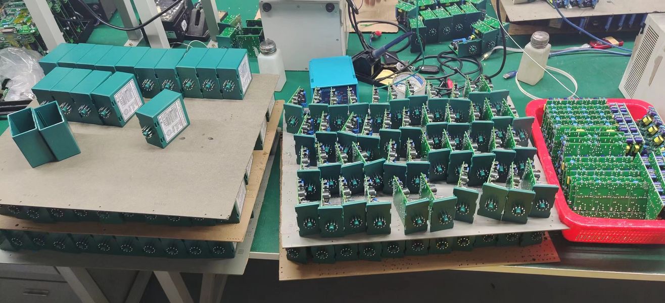 Shenzhen Jutai Comm Co., Ltd. línea de producción del fabricante