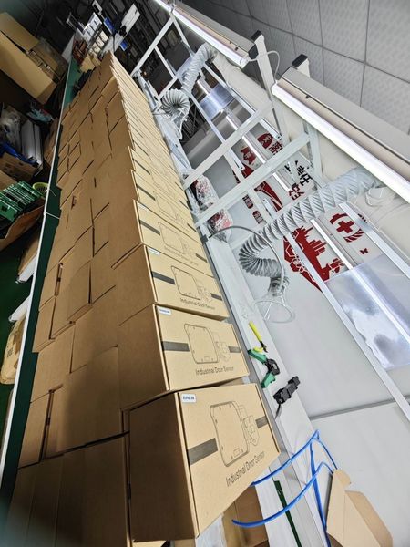 Shenzhen Jutai Comm Co., Ltd. línea de producción del fabricante