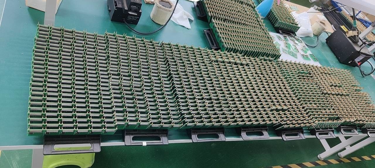 Shenzhen Jutai Comm Co., Ltd. línea de producción del fabricante